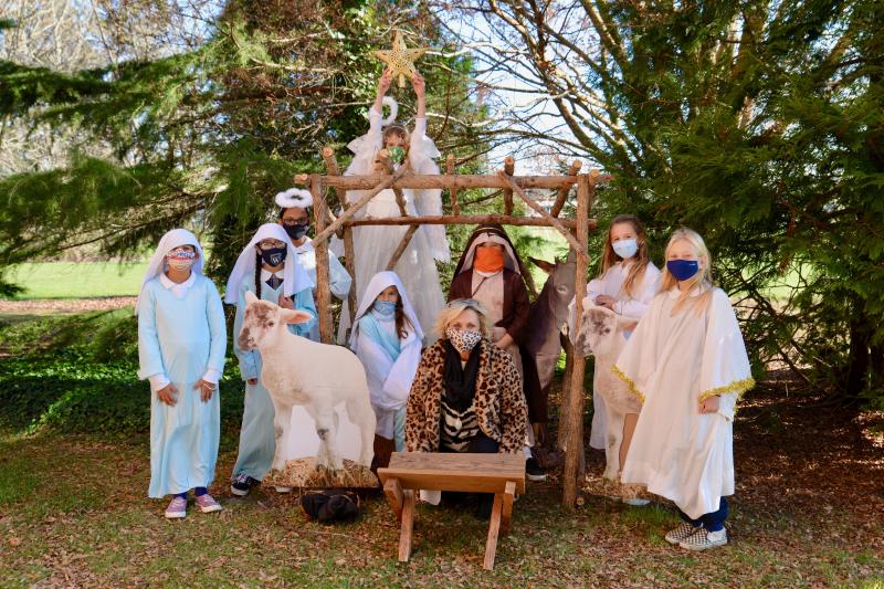 Worcester Prep fifth-graders shown while filming the manger scene for “Just One Candle,” the lower school virtual musical, are (l-r) Keerat Brar, Berlin, Md.; Noa Bouzaglo, Berlin; Ruhi Chapla, Salisbury, Md.; Ellie Phillips, Ocean City, Md.; Rani Yonker, Ocean City; Ayven Browne, Dagsboro; Payton Caprarola, Berlin; and Scarlett Shimko, Berlin. In front is Joanie Brittingham, lower school music director. SUBMITTED PHOTOS